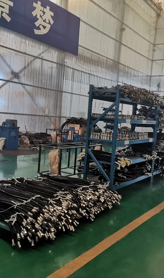Britop factory workshop: finished hose assemblies on storage racks