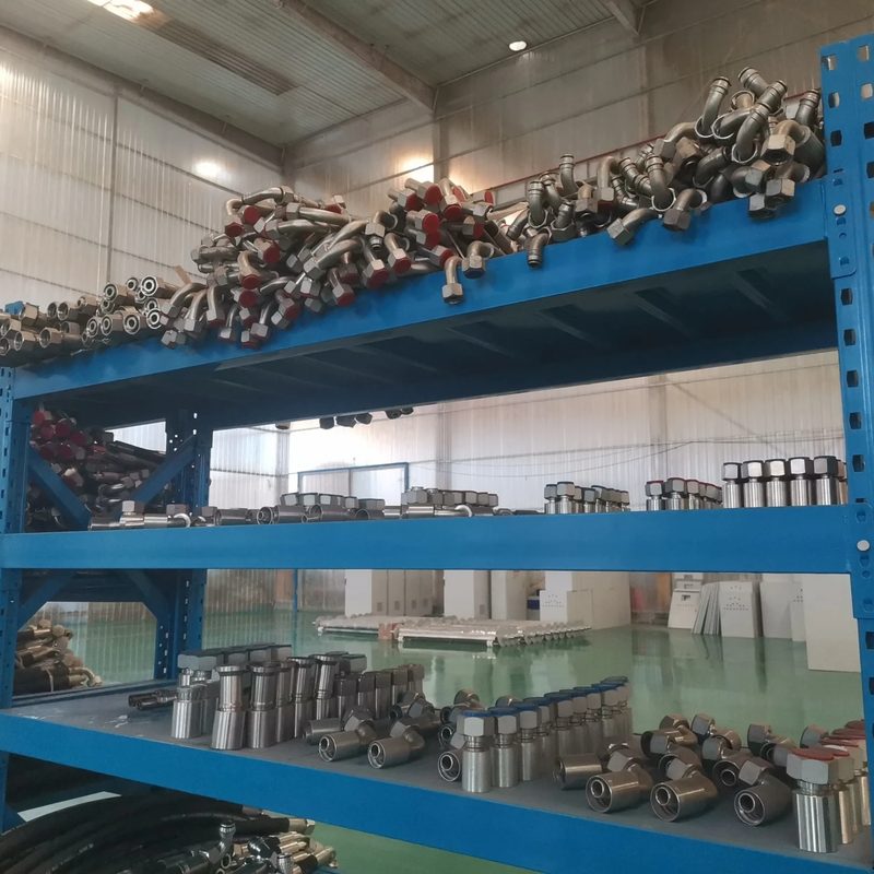 Britop factory workshop: stainless steel fittings on storage shelves